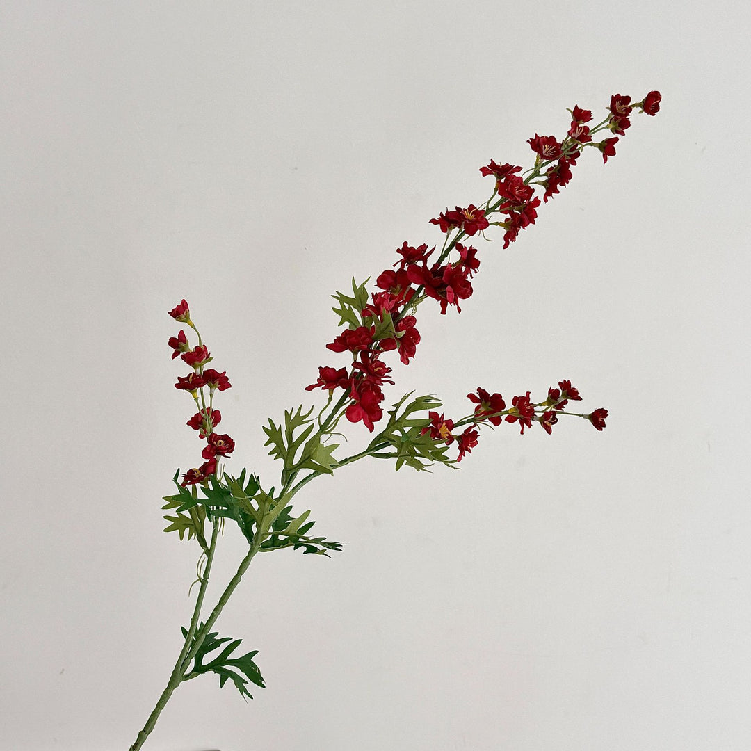 Künstlicher Blütenzweig mit detailreichen roten Blüten Karnz