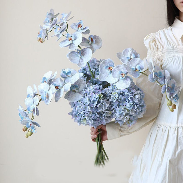Lebensechte künstliche Orchideenarrangement