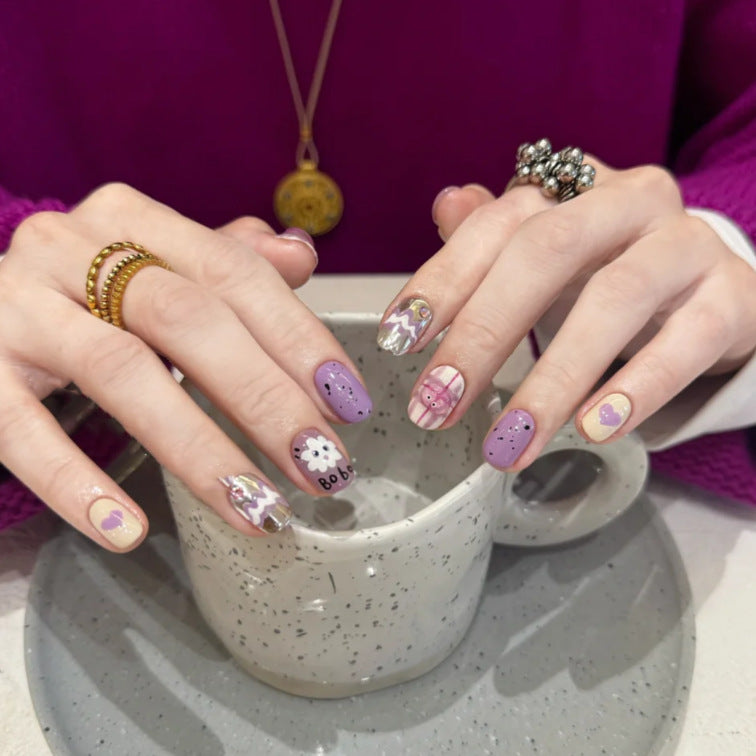 Verspieltes, cartoon-themed Press-On Nail Art Set Karnz