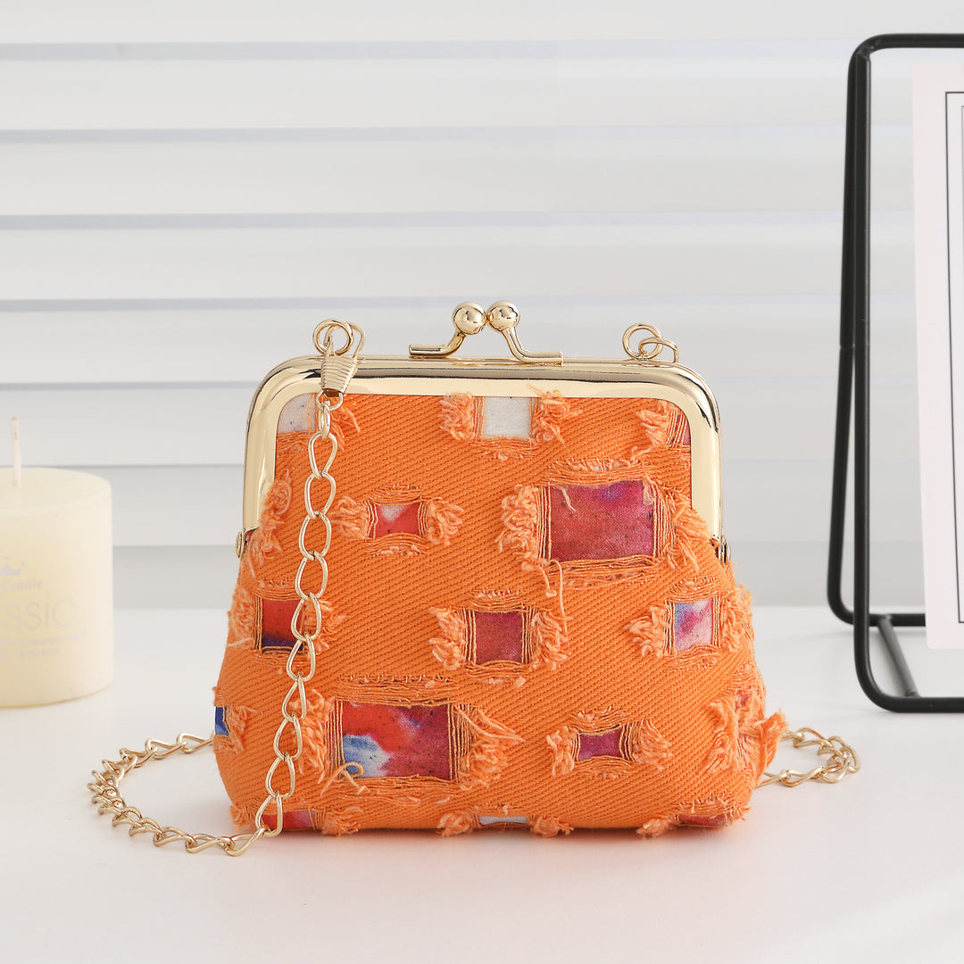 Vintage-inspirierte Stoff-Clutch