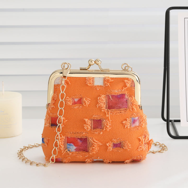 Vintage-inspirierte Stoff-Clutch