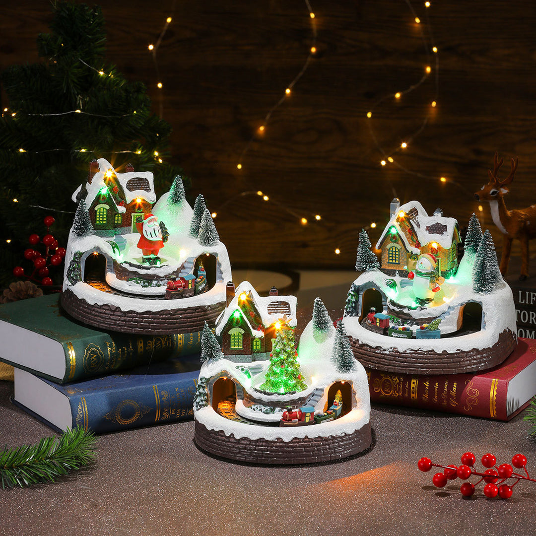 Beleuchtete Weihnachts-Schneekugel-Szene Karnz