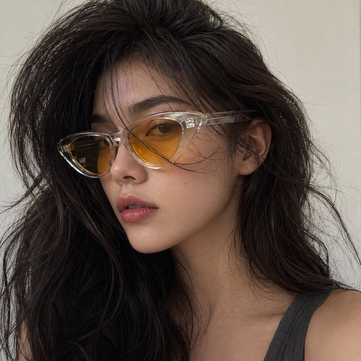 Damen Cat-Eye Sonnenbrille mit transparenter Rahmenkonstruktion und gelben Gläsern Karnz