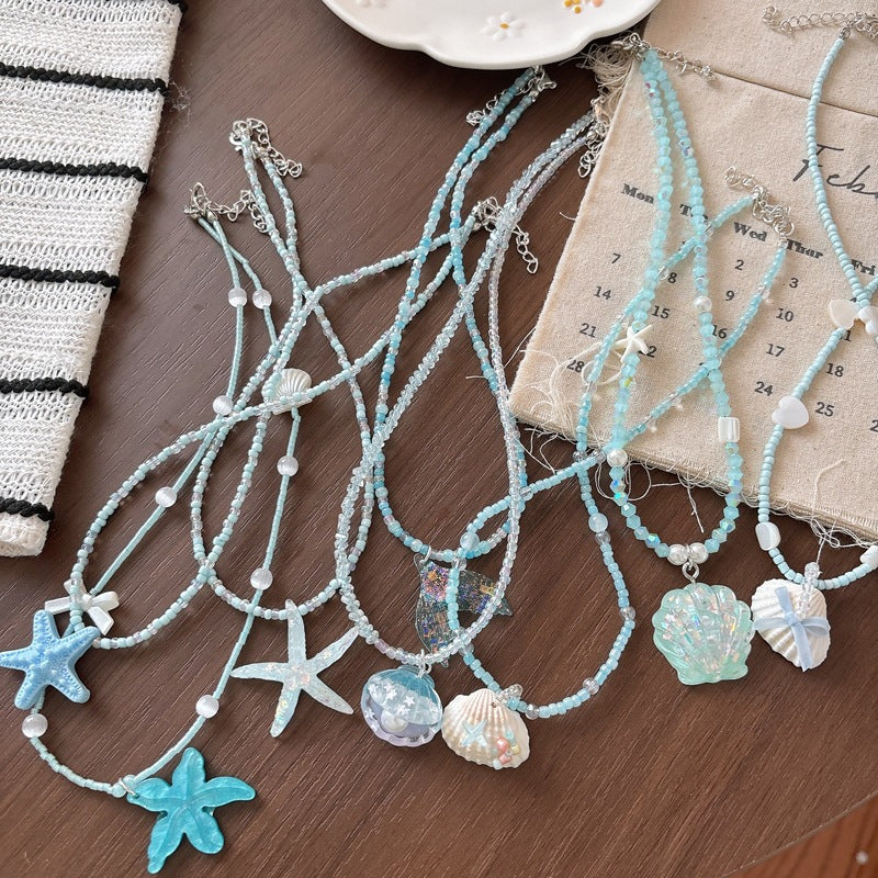 Halskette mit Glitzerfischschwanz Karnz