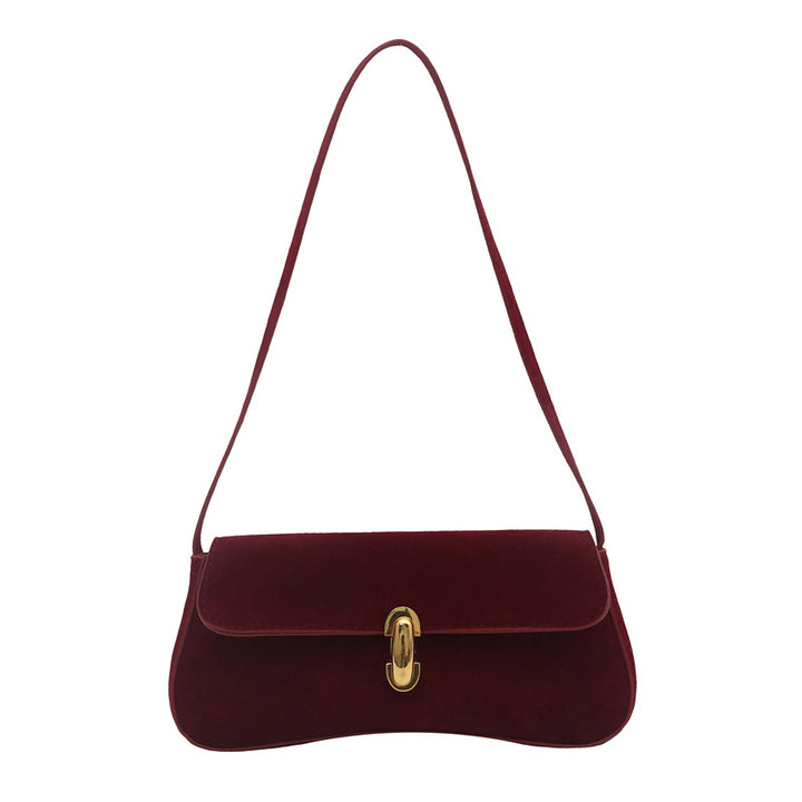 Elegante Wildleder-Handtasche mit verspieltem Schlüsselanhänger