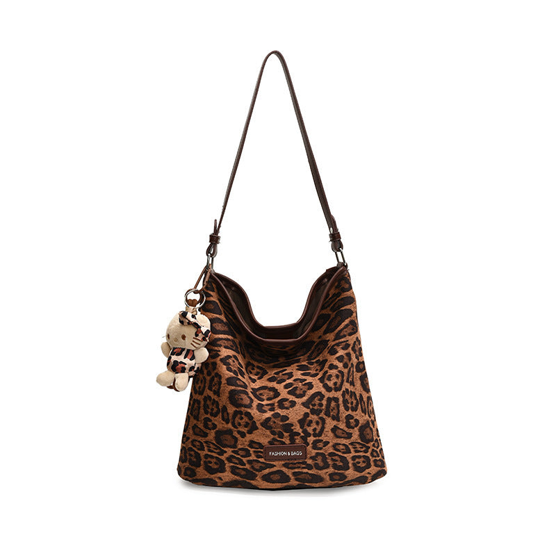 Stylische reversible Schultertasche