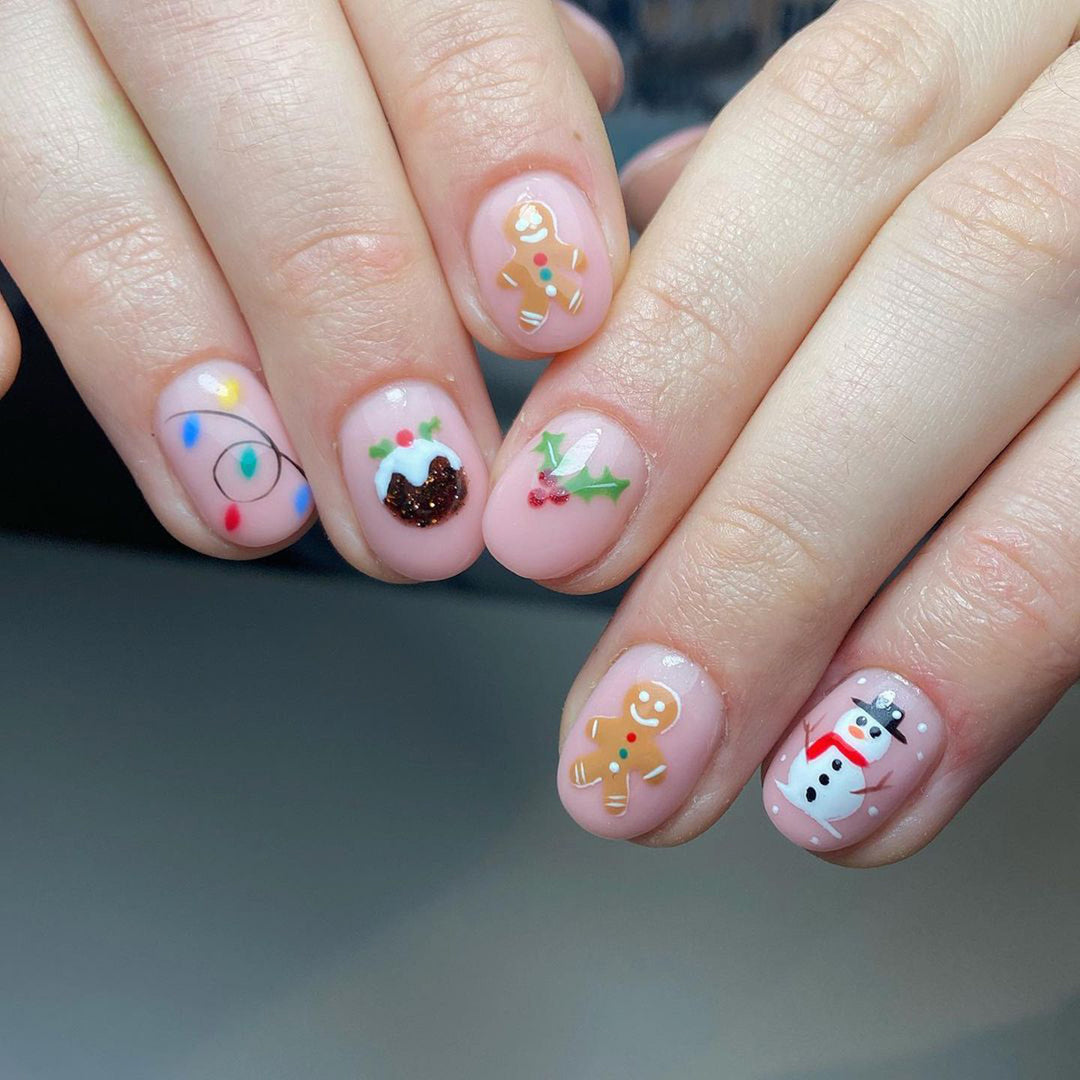 Kunstnagelset mit festlichen weihnachtlichen Motiven Karnz