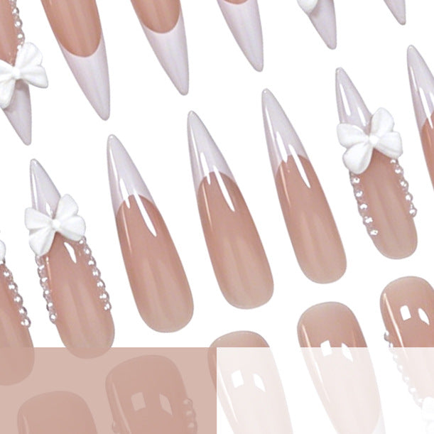 Elegante mit Schleife verzierte Nagelkunst Karnz