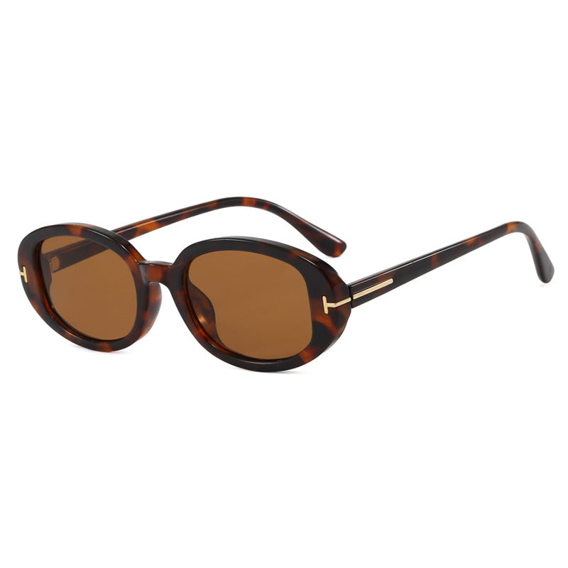 Damen stilvolle ovale Sonnenbrille mit goldenen Details Karnz