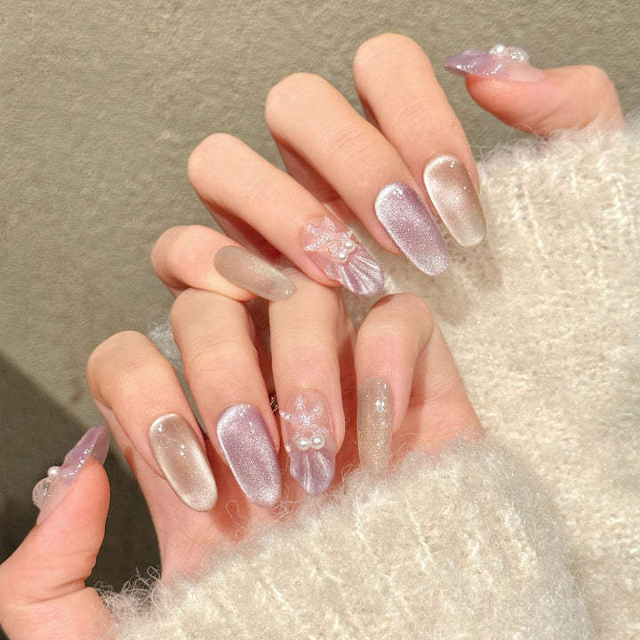 Elegantes dekoratives Press-On-Nagelkunstset mit Perlen- und Glitzerakzenten