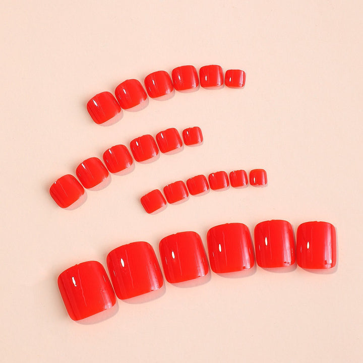 Kunstnagelset in strahlendem Rot Karnz