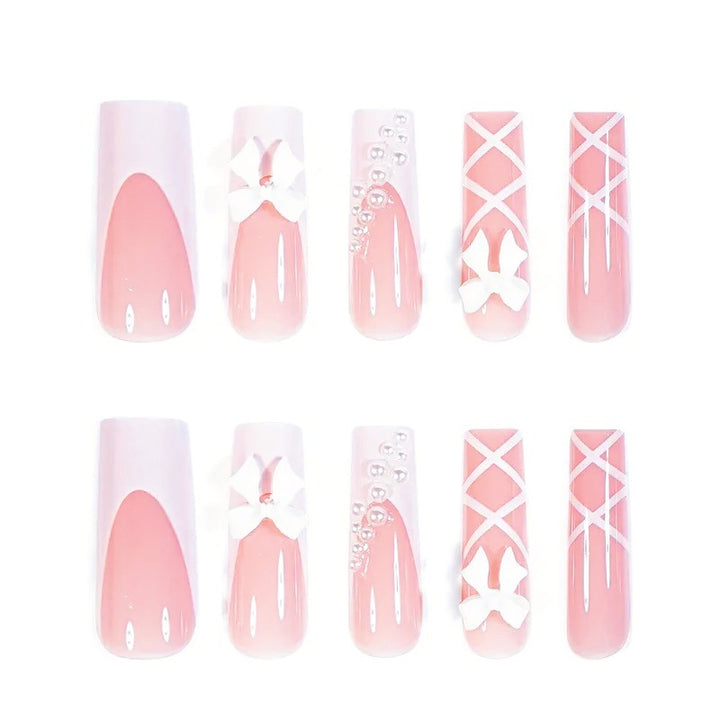 Kunstnagelset mit eleganten 3D- Schleifen und Perlenverzierungen Karnz