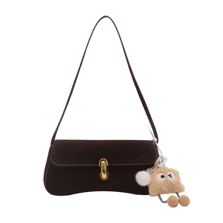 Elegante Wildleder-Handtasche mit verspieltem Schlüsselanhänger