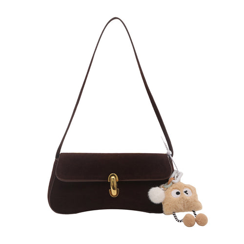 Elegante Wildleder-Handtasche mit verspieltem Schlüsselanhänger