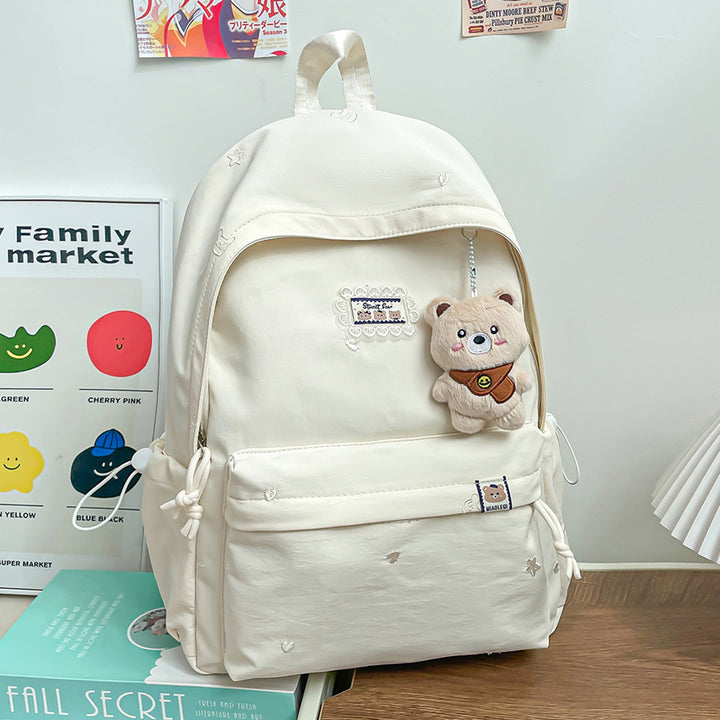 Stylischer backpack mit floralem Schmuck Karnz