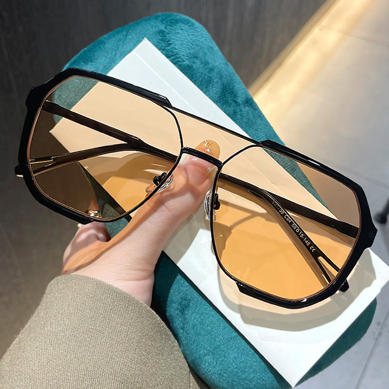 Damen geometrische Sonnenbrille mit besonderem Rahmen und UV-Schutz Karnz
