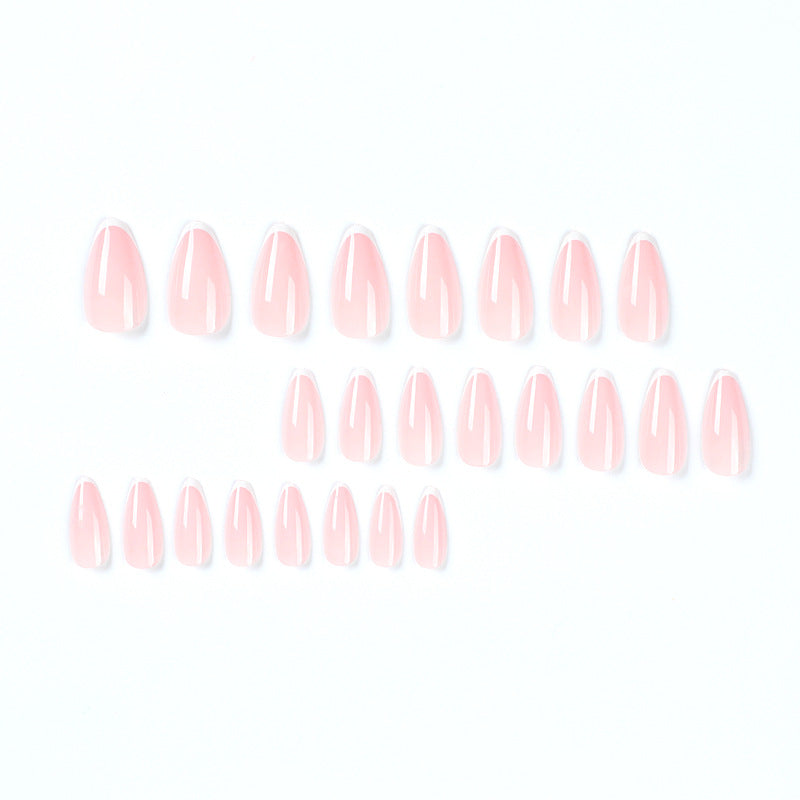 Kunstvolle Stiletto-Nägel mit elegantem French-Tip Design Karnz