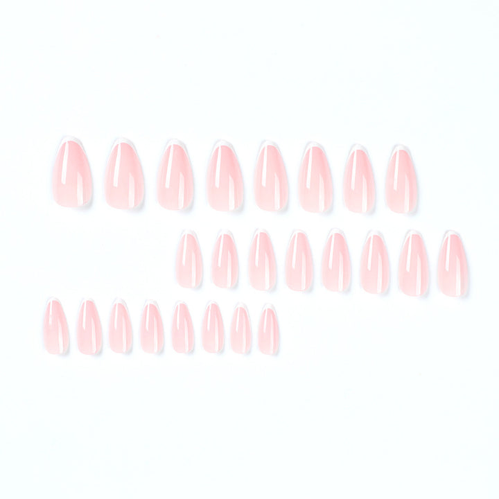 Kunstvolle Stiletto-Nägel mit elegantem French-Tip Design Karnz