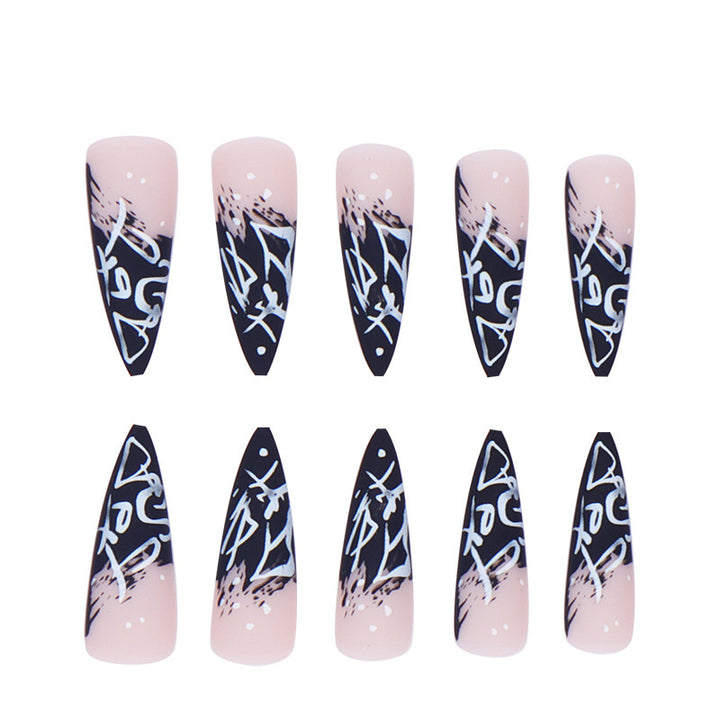 Künstlerische Stiletto Press-On Nägel mit abstraktem Design Karnz