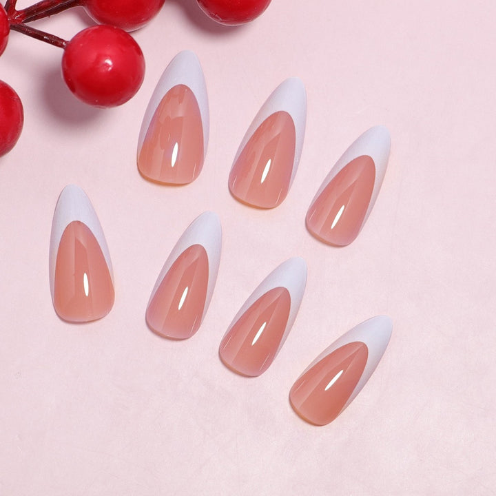 Elegante Stiletto Press-On Nägel mit elegantem französischen Tippdesign Karnz