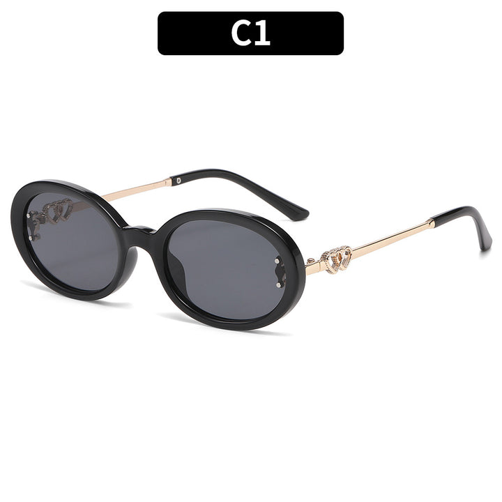 Premium ovale Rahmen-Sonnenbrille mit dekorativen Metallelementen