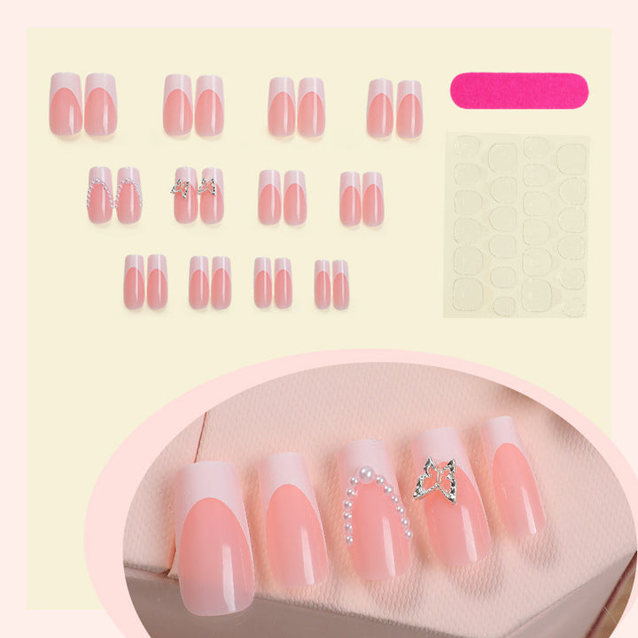 Künstlerisches Press-On Nagelset mit Schmetterlings- und Juwelenakzenten Karnz