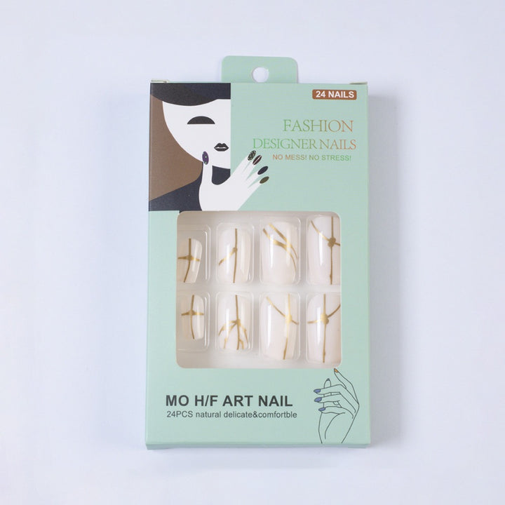 Kunstnägel mit elegantem goldenen Linienmuster Karnz