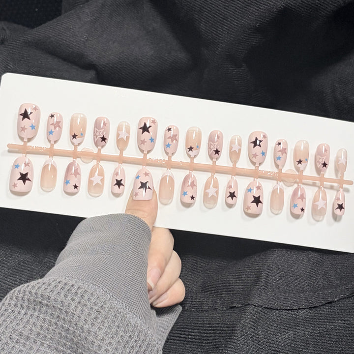 Künstlerisches Press-on-Nagelset mit Sternmustern Karnz