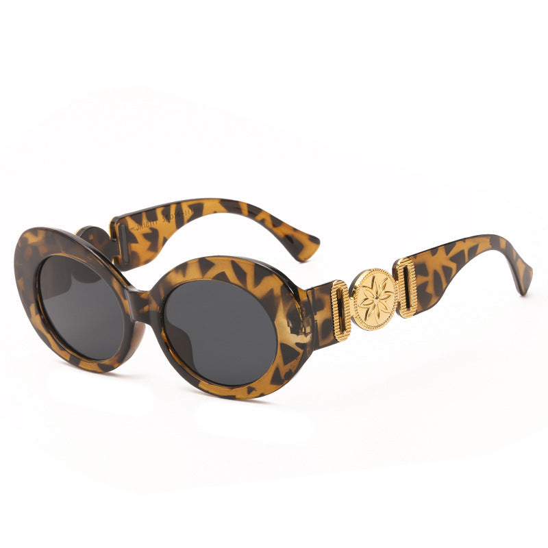 Damen modische Sonnenbrille mit auffälligen goldenen Akzenten Karnz