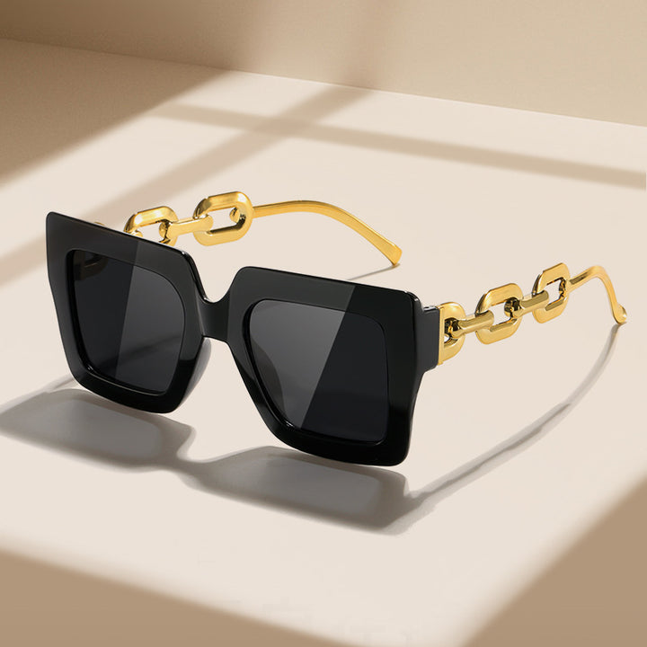 Damen Modische Sonnenbrille mit einzigartigem rechteckigen Rahmen und Kettendetails Karnz