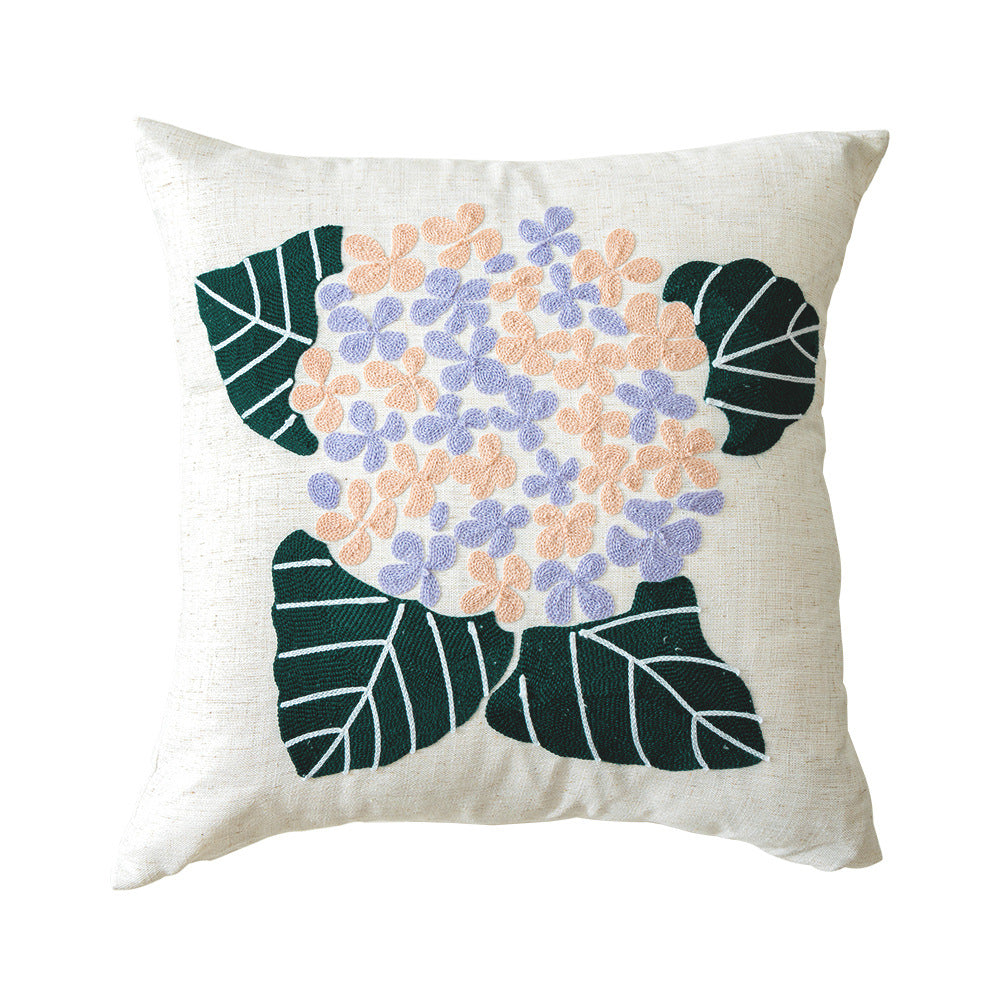 Quadratisches Bouclé-Dekokissen mit getufteter Blumenapplikation