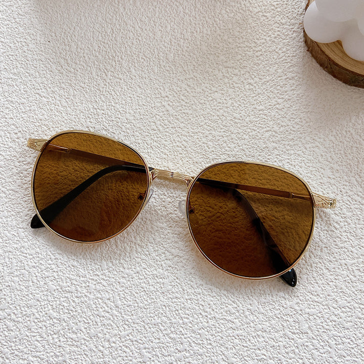 Modische Sonnenbrille mit Rundem Rahmen und Filigranem Design Karnz