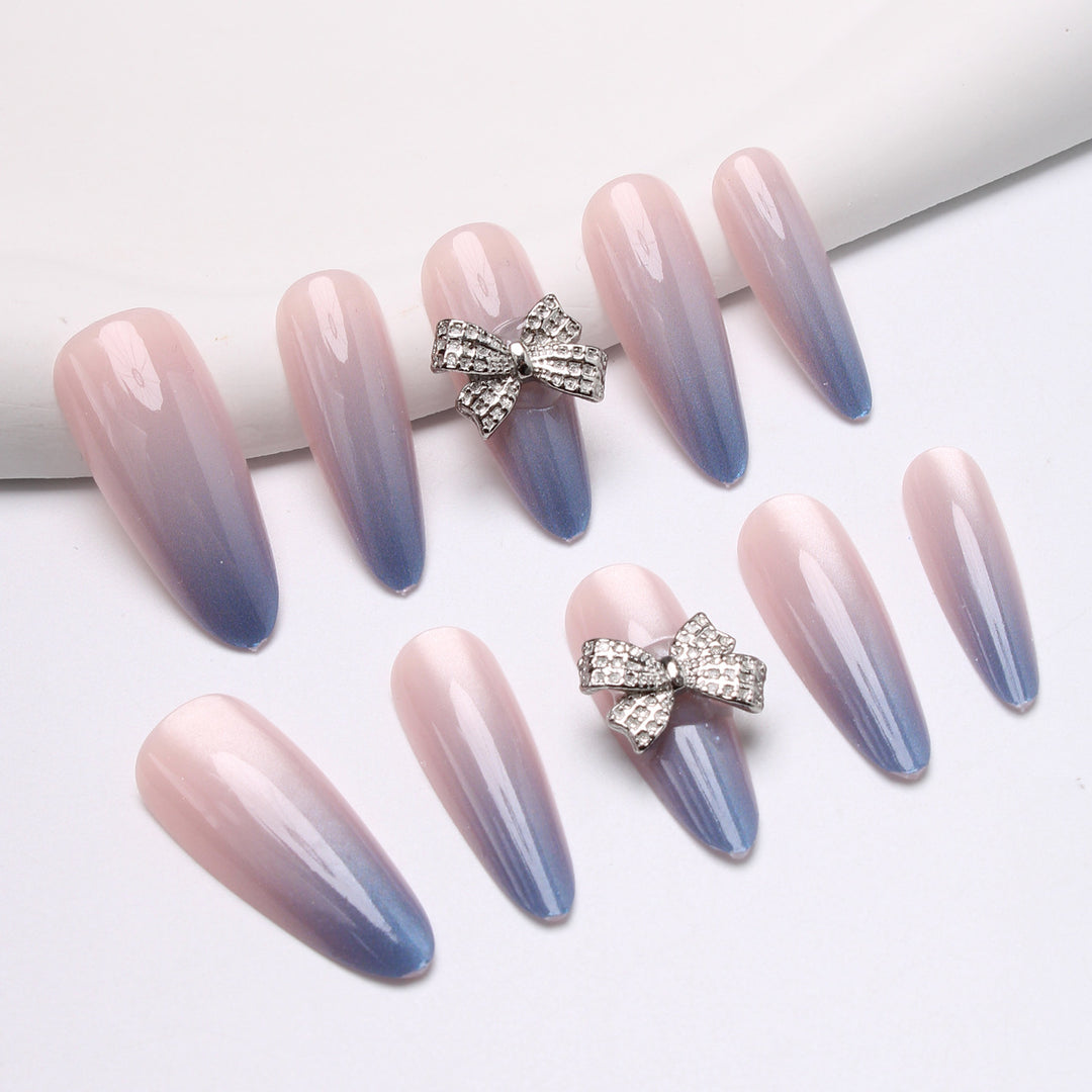 Elegante Stiletto Press-On Nägel mit Strassschleifen Karnz