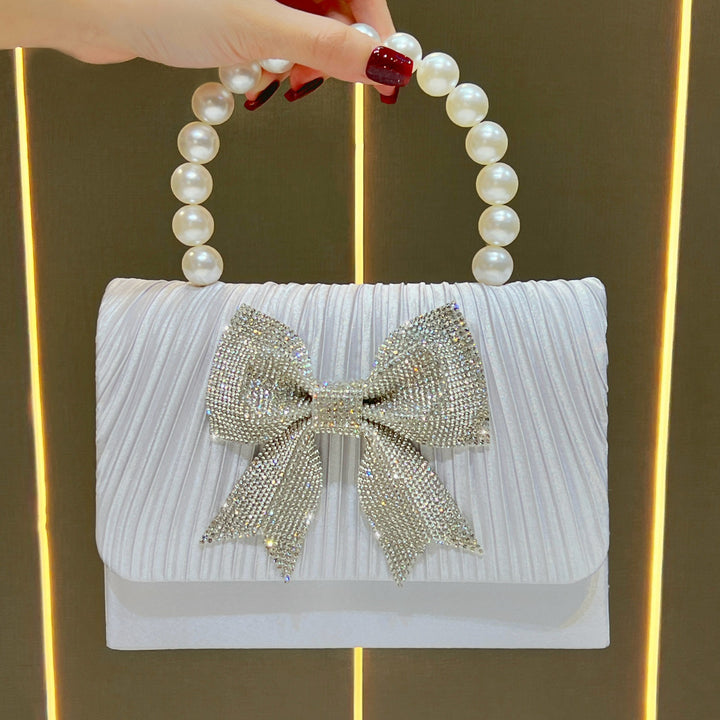 Elegante Abendtasche mit Schleifenverzierung