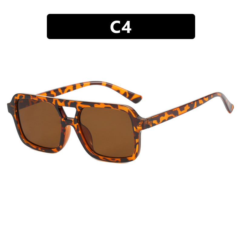 Damen moderne quadratische Sonnenbrille mit schützendem UV-Filter und transparentem Rahmen Karnz