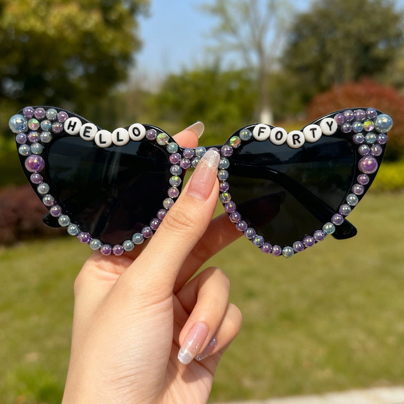Perlenverzierte Cat-Eye-Sonnenbrille Karnz