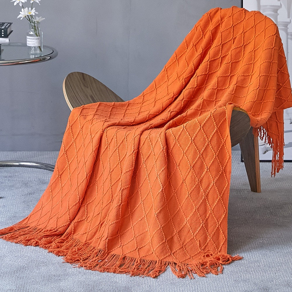 Gemütliche strukturierte gestrickte Wurfdecke