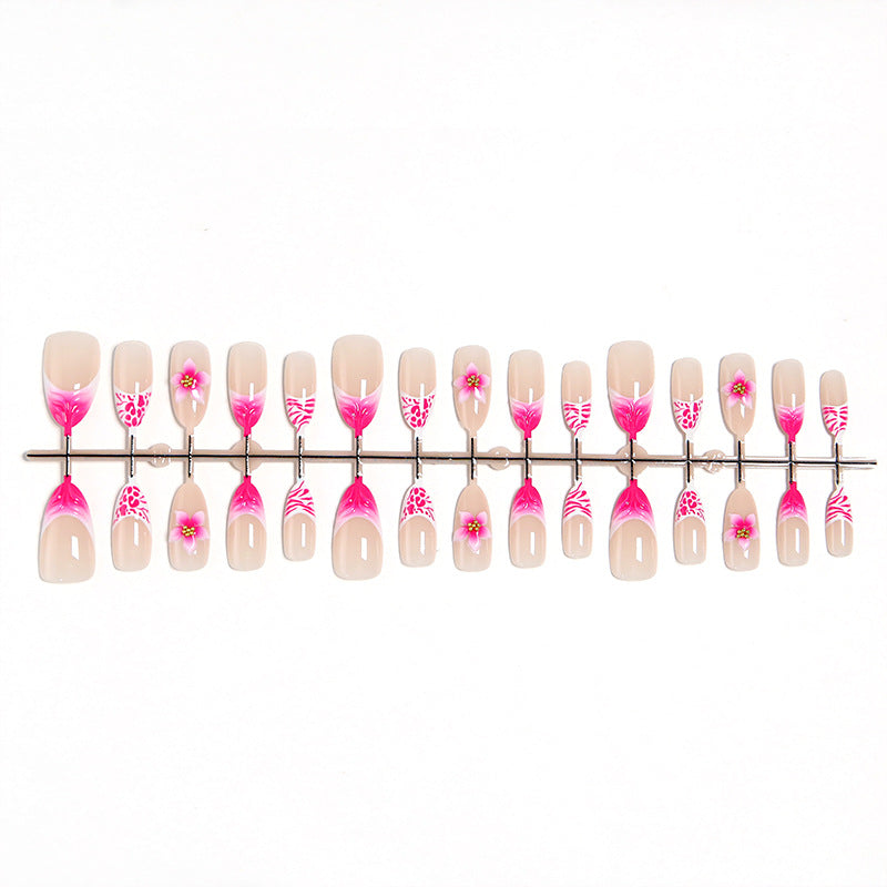 Kunstnagel-Set mit floralem Design und Glitzerdetails Karnz