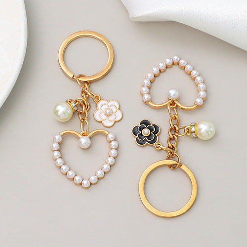 Schlüsselanhänger mit Herz- und Blütenmotiv Karnz