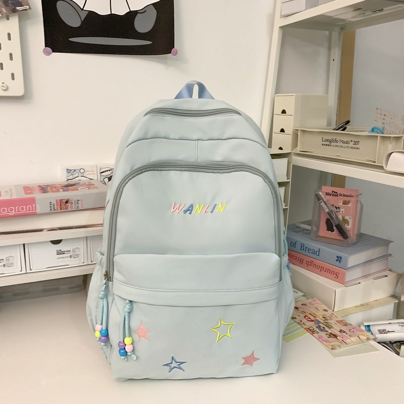 Verspielter mit Sternen verzierter Rucksack Karnz