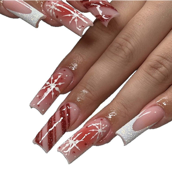 Kunstnagelset mit festlichen Zuckerstangen- und Glitzerakzenten Karnz