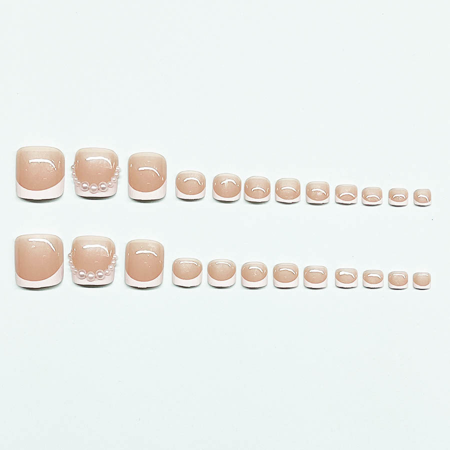 Kunstnagelset für Fußnägel mit eleganten Spitzenverzierungen Karnz