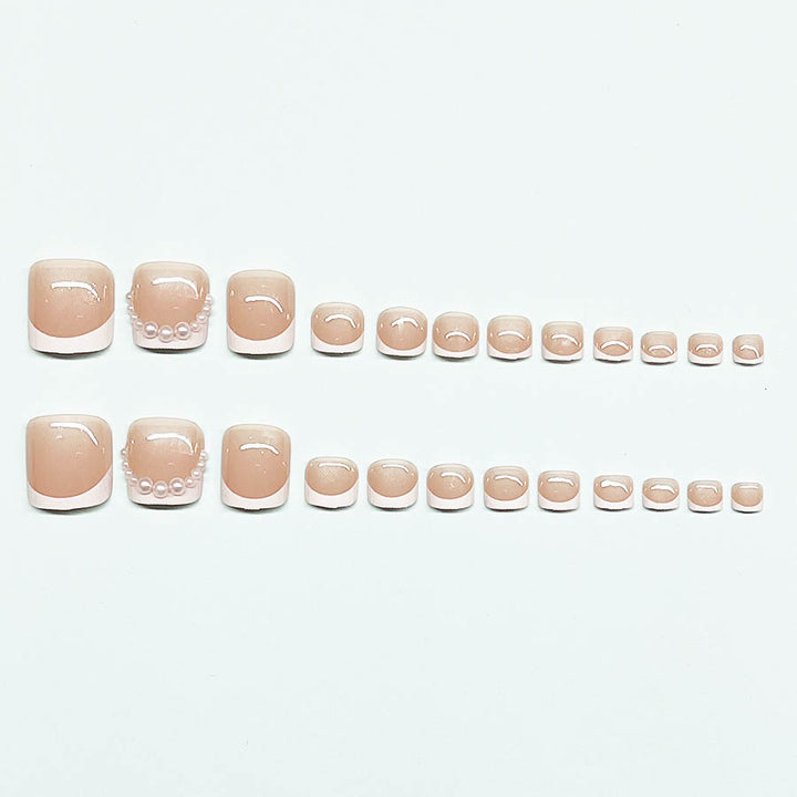 Kunstnagelset für Fußnägel mit eleganten Spitzenverzierungen Karnz
