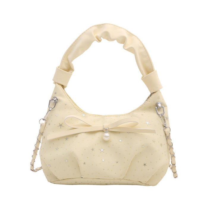 Elegante Handtasche mit Schleifendetail und Sternenprint