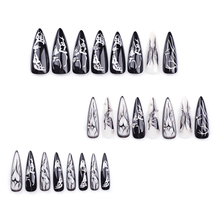 Kunstvolle Nagelkunst mit elegantem Schwarz-Weiß-Design Karnz