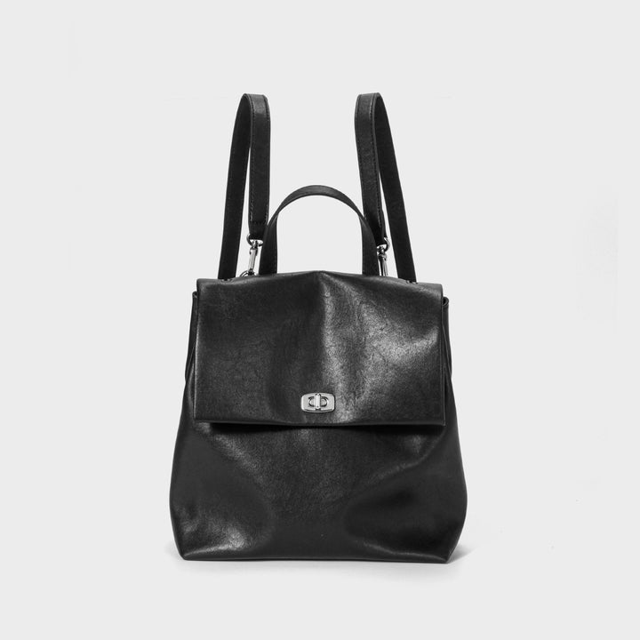 Umwandelbare Leder Klappen-Rucksack-Handtasche mit Obergriff und Drehverschluss