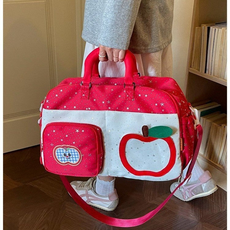 Verspielt gemusterte Reisetasche Karnz