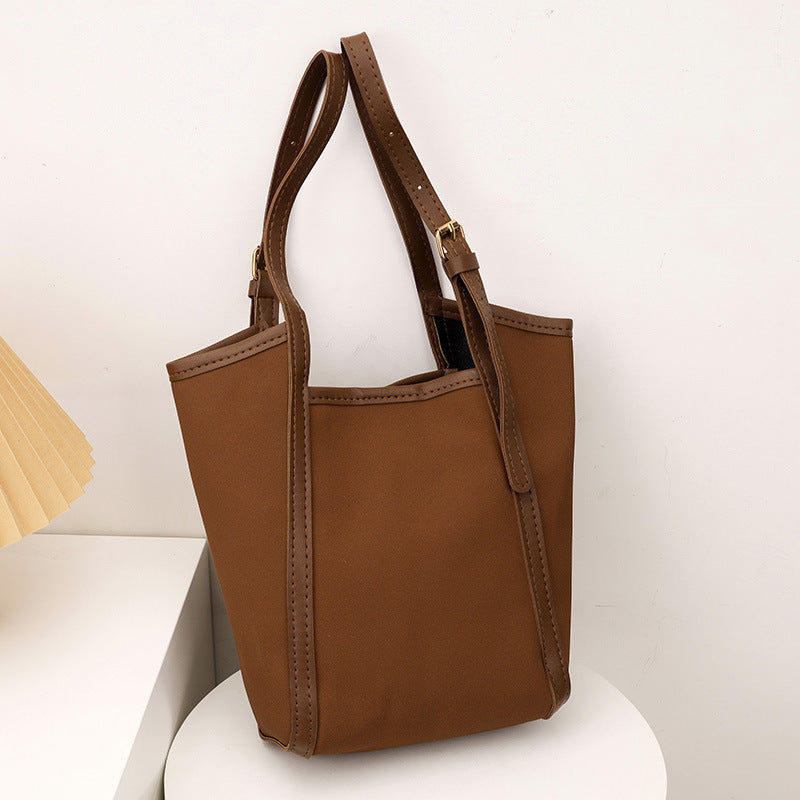 Minimalistische Zip-Top Handtasche Karnz