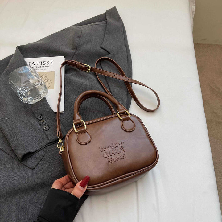 Vintage-inspirierte strukturierte Handtasche Karnz