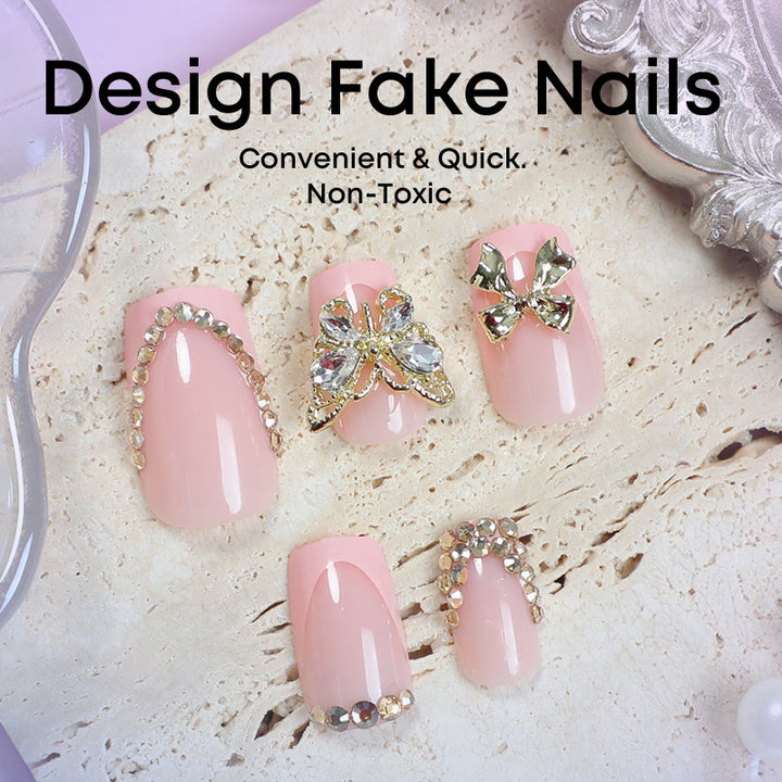 Glamouröses Kunstnagelset mit floralen Akzenten und Glitzerverzierungen Karnz